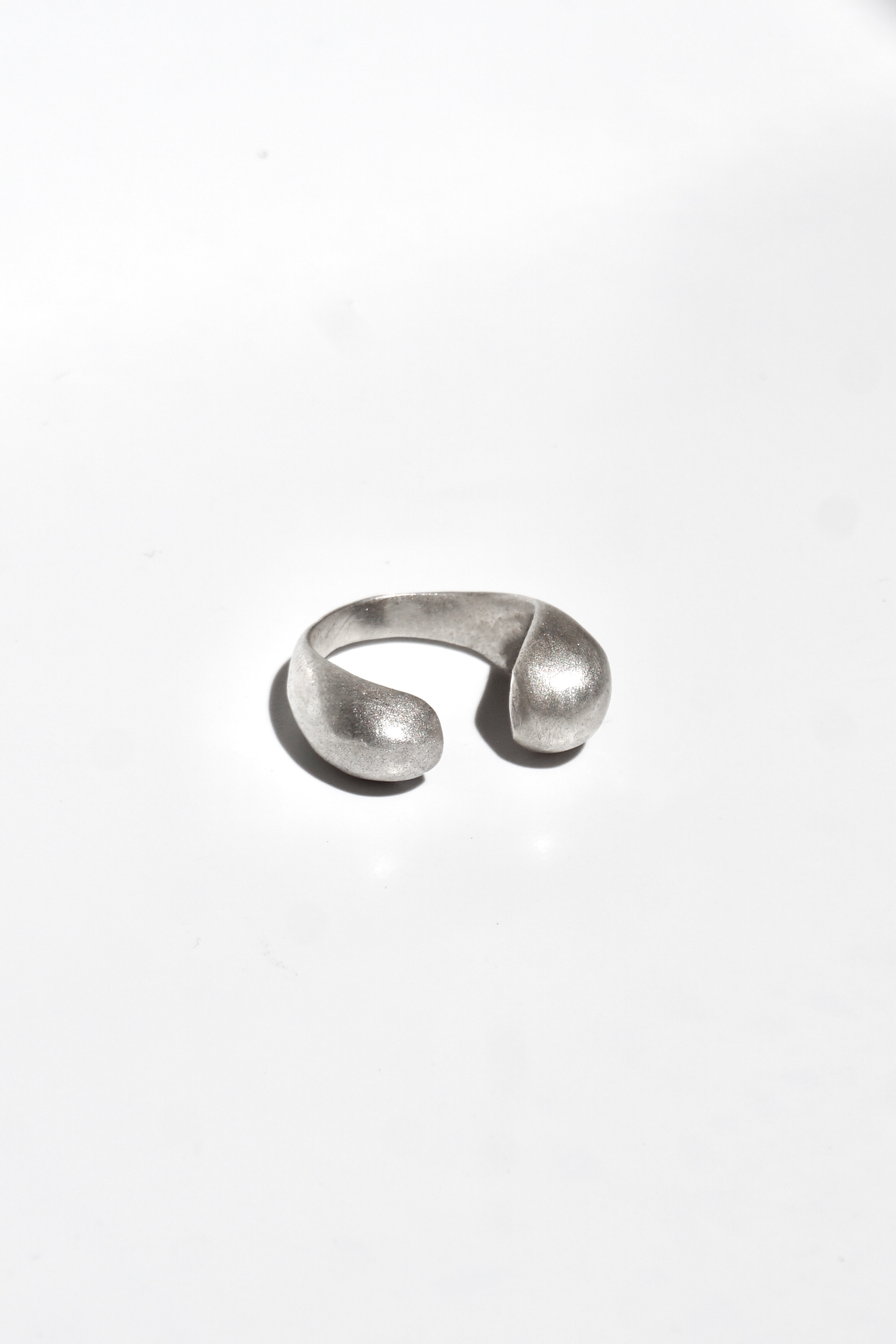 Two drop open ring